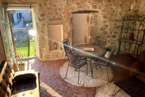 Appartements Gite romantique dans maison vigneronne : photos des chambres