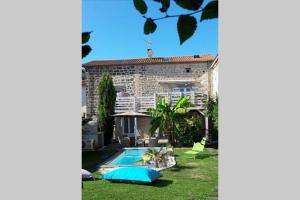 Appartements Gite romantique dans maison vigneronne : photos des chambres