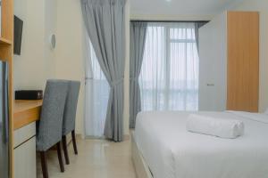Pleasant and Simply Studio Room Menteng Park Apartment By Travelio