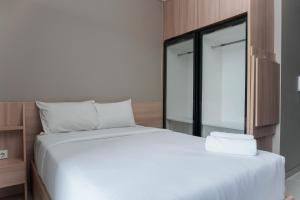 Comfortable Design Studio Apartment Ciputra International By Travelio