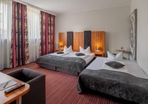 Triple Room room in Arthotel ANA Style Augsburg