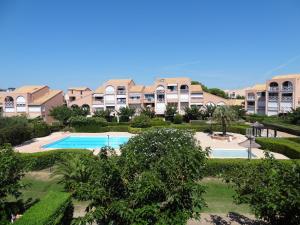 Appartements Appt T2, Piscine, la Plage a 130m! Parking prive clos, Lave-linge, Lave-vaisselle, Draps, Linge et Menage inclus! : photos des chambres