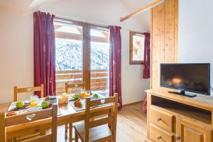 Complexes hoteliers travelski home select - Chalets Le Grand Panorama II 3 stars : photos des chambres