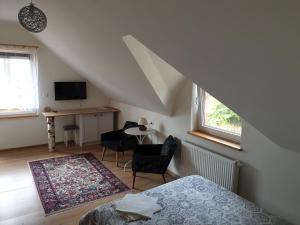 Pod Dębami - pokoje na Mazurach