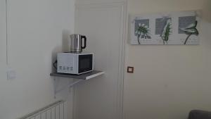 Appartements Joli studio proche de DisneyLand Paris : photos des chambres