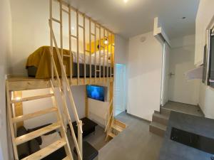 Appartements L'Atypique - Au Coeur d'Agen - Self Checkin - Wifi - Netflix - Smart TV - Luqs fr : photos des chambres