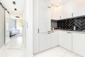 Apartament Wyzwolenia Gdańsk Nowy Port by Renters