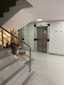 Apartamento á 30 metros praia, com vista mar.