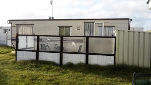 AMELAND-Nes-Duinoord: Stacaravan (chalet) + fietsen direct aan zee!