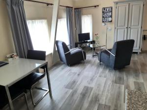 Logement De witte klok