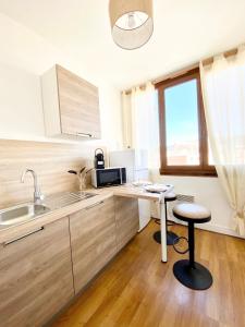 Appartements Le Wood, entre centre ville et plage : photos des chambres