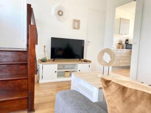 Appartements Le Wood, entre centre ville et plage : photos des chambres