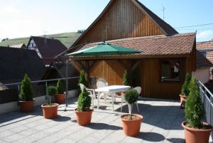 Appartements Gite Du Vigneron : photos des chambres