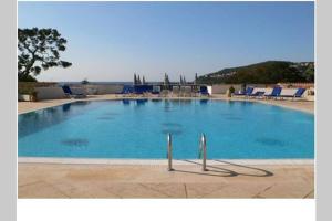 Appartements La Petite Cachette - Pool and 150m to the beach : photos des chambres