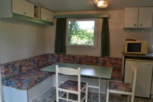 Campings mobil home du houx : photos des chambres