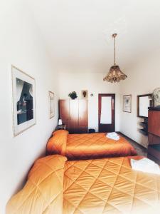 Camera Standard Doppia con Letti Singoli con Bagno in Comune