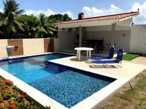 Casa completa com piscina e área de laser completa na praia BELA - PB - 皮廷布