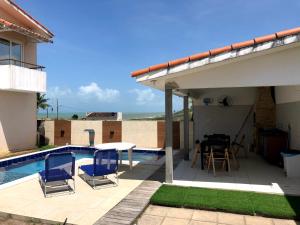 Casa completa com piscina e área de laser completa na praia BELA - PB