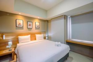 Cozy and Spacious Studio Apartment at Mustika Golf Residence By Travelio