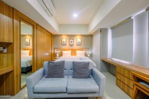 Cozy and Spacious Studio Apartment at Mustika Golf Residence By Travelio