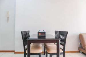 Simply 1BR Grand Palace Kemayoran Apartment By Travelio