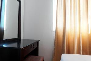 Simply 1BR Grand Palace Kemayoran Apartment By Travelio