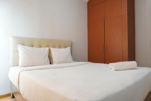 Simply 1BR Grand Palace Kemayoran Apartment By Travelio