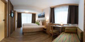 Triple Room with Balcony room in Gasthof Sportalm