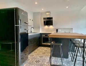 Appartements Les Trois B - Hypercentre de Beaune : photos des chambres
