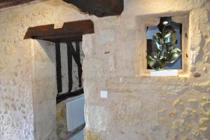Maisons de vacances Le Pigeonnier, maison de charme au pied du chateau : photos des chambres