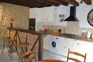 Maisons de vacances Le Pigeonnier, maison de charme au pied du chateau : photos des chambres