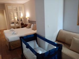Triple (3 Adults) room in Hotel Cuéntame La Puebla