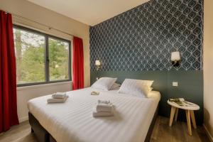 Villages vacances Center Parcs Les Hauts de Bruyeres : photos des chambres