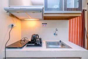 Cozy and Simple Living Studio Apartment at Cinere Resort By Travelio