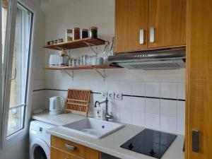 Appartements 2 pieces- rue pietonne Trouville -Le petit juliana : photos des chambres