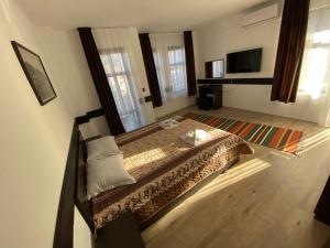 Апартхотел "Старият Град" в етнографски комплекс