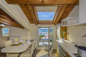 Attico panoramico fronte mare