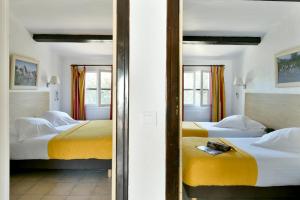 Quadruple Room with Bathroom room in Hôtel Mas de la Grenouillère