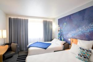 Hotels Novotel Massy Palaiseau : photos des chambres