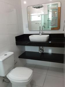 Apartamento com ar condicionado e Wi-fi, frente mar - 02 dormitórios - Edifício Luz do Sol