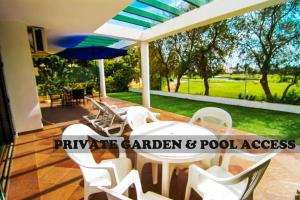 Two-Bedroom Apartment with Private Garden and Swimming Pool access room in Roquetas Beach and Playa Serena Golf Village