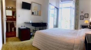 Hotels Hotel des Mimosas : photos des chambres