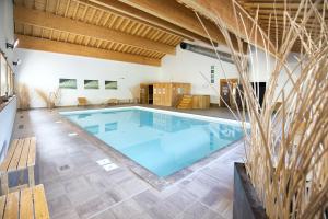 Appartements Le Hameau SPA & PISCINE studio 4pers by Alpvision Residences : photos des chambres