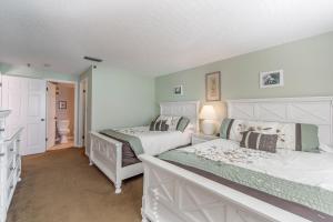 Corner Unit Johns Pass View- Beach Place #101