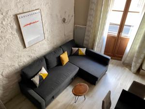 Appartements La Maison d'Alix, a l'interieur de la Cite medievale! : photos des chambres