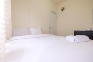 Cozy 2BR at 28th Floor Green Pramuka City Apartment By Travelio