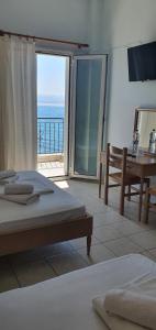 Triple Room with Sea View room in Artemis Hotel