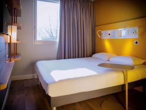 Hotels ibis budget Reims Parc Des Expositions : photos des chambres