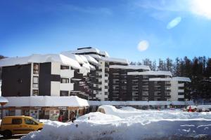 Studio 3 personnes idéalement situé, au pied des pistes et proche commerces