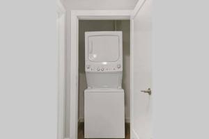 Luxury Apartment with Gym, Steps From Commuter Rail #3013